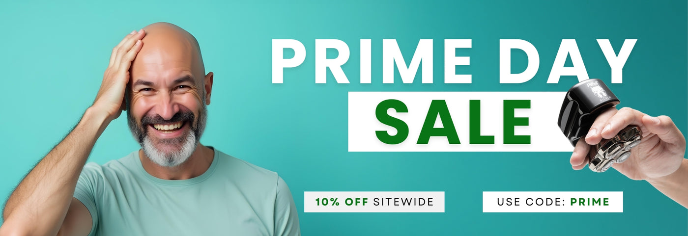 Skull Shaver Prime Day Sale banner featuring a smiling bald man on a backdrop. A hand holds a Skull Shaver close-up on the right. Bold text reads ‘PRIME DAY SALE.’ Promotional text below highlights ‘10% SITEWIDE’ and ‘USE CODE: PRIME’.
